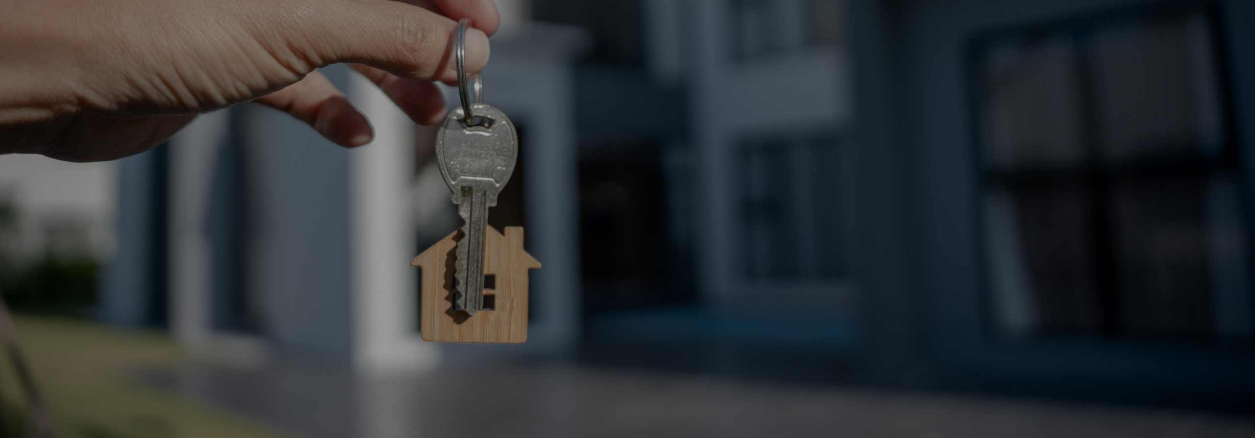 A hand holding keys to a Scottsdale home for sale